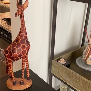 Wooden giraffe statue